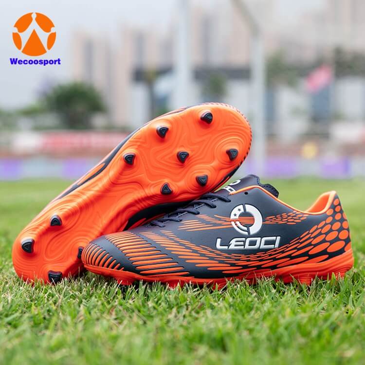 boy orange soccer shoes for kids